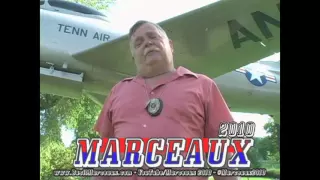 YTP - Basil Marceaux stands next to a plane