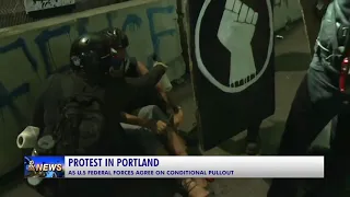 PROTEST IN PORTLAND AS U.S FEDERAL FORCES AGREE ON CONDITIONAL PULLOUT
