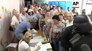 Poroshenko, Turchynov, Klitschko and "Darth Vader" vote, observers react