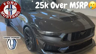 Ford Mustang Dark Horse 25k over MSRP.