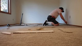 Preferred method to trim and tuck carpet using a wall trimmer