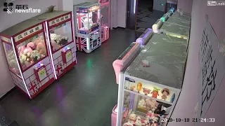 Firefighters free 4 year old girl stuck inside claw machine in eastern China