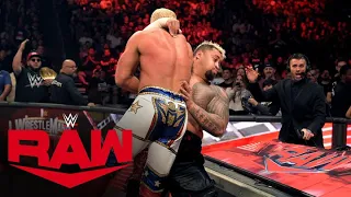 Solo Sikoa brutally drives Cody Rhodes into the announce table twice on WrestleMania Raw