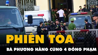 Cảnh sát dẫn giải bà Nguyễn Phương Hằng và các đồng phạm đến tòa