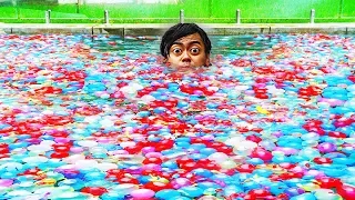 I Filled My Swimming Pool with 10,000 Water Balloons!