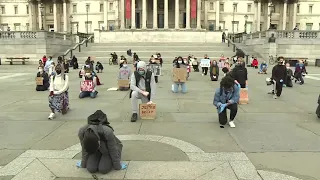 Black Lives Matter protesters take a knee on Trafalgar Square | AFP