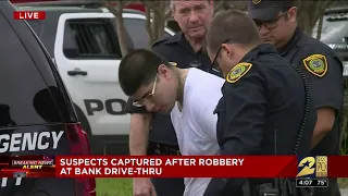 Suspects captured after robbery at bank drive-thru