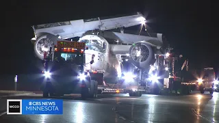 Watch crews move a massive, Cold War-era plane overnight