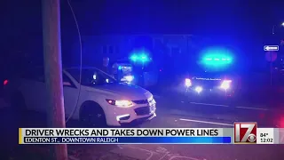 Driver wrecks and takes down power lines in Raleigh