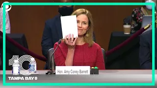 Judge Amy Coney Barrett holds up blank notepad during confirmation hearing