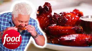 "Messy, Nasty, and Tiki!" Guy Fieri Tries Fiery Southern Chicken Wings  | Diners Drive-Ins & Dives