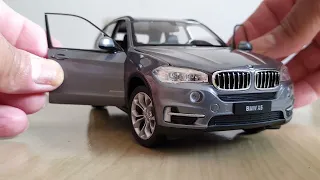 unboxing da miniatura BMW x5 da marca  welly-1/24