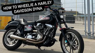 HOW TO WHEELIE A HARLEY DAVIDSON DYNA