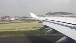 Lufthansa A340-600 take off from hazy Mexico City to Munich