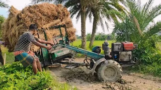 Power tiller loads more paddy //  tries to lift from high land // tries to lift from pits