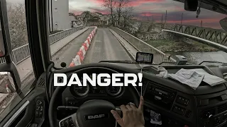 IT TAKES COURAGE TO CROSS THIS BRIDGE WITH A LOADED TRUCK