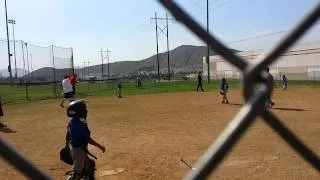 Jesse's home run over the fence age 6