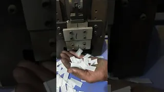 Paper folding and cutting machine