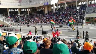 Attari-Wagah border ceremony - run with flag