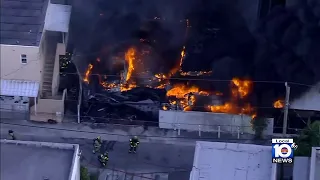 House fire in Miami produces large flames, thick black smoke