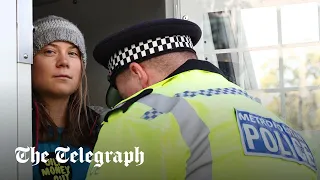 Greta Thunberg arrested as she blocks oil bosses outside London hotel