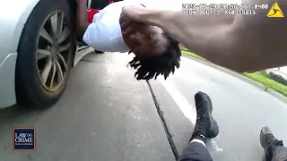 Bodycam: Getaway Driver Drags Cop After Teen Suspect Hops in Back Seat During Foot Chase