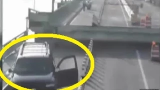 [CCTV] Driver distracted by his GPS caught on camera jumping drawbridge as it opened in Florida