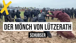 14.01.2023 Der #Mönch von #Lützerath schubst Polizisten in den Schlamm während #LütziBleibt-Demo