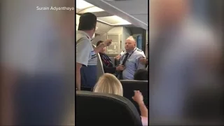 American Airlines | Mom crying during confrontation with flight attendant