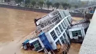 Two ships capsize on south China river due to flooding