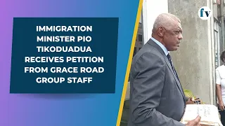 Immigration Minister Pio Tikoduadua receives petition from Grace Road Group staff