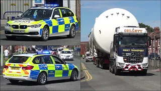 Large medical grade Nitrogen tanker escorted by police cars and motorcycles
