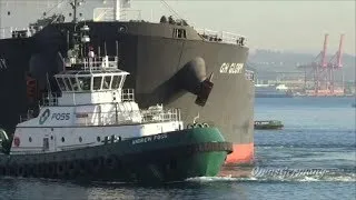 Foss Tugs Push Out Bulk Ship in Elliott Bay