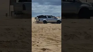 2013 hilux doing it tuff on the sand bogged on stockton beach