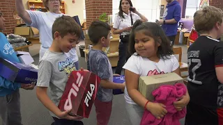 Washington Elementary get shoes from the Genesis Foundation