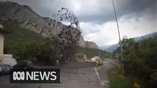 Powerful mudslide crashes through village in Switzerland, damaging cars and properties