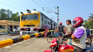 Traffic Jam Public Stuck On Railgate : Colorful Speedy Emu Local Train Furiously Moving