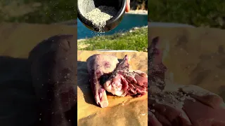 How to cook meat in sand