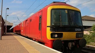 Royal Mail Class 325 departs Warrington Bank Quay