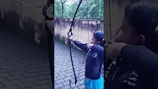 Archery kid left hand Arrow shooting