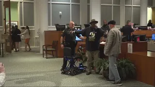 Activist taken into custody during City Council meeting in Jacksonville