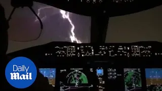 Terrifying moment lightning strikes plane as it prepares for landing