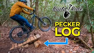 Building a “pecker log" jump and a new berm!