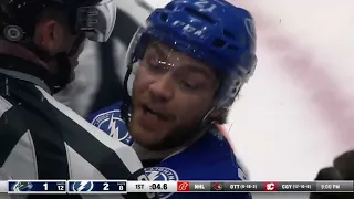 Brayden Point goes to Connor Garland not happy with the hit