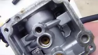 How to clean a carburetor on an 8hp Mercury outboard engine