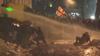 Georgian police use water cannons to try to disperse Tbilisi protest crowd