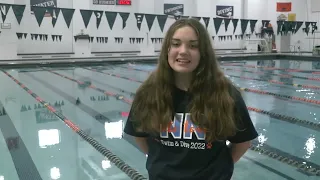Teen swimmer who had foot amputated makes school history