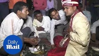 Shocking moment groom is shot at his own wedding ceremony - Daily Mail