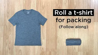 How to roll a t-shirt for packing step-by-step.