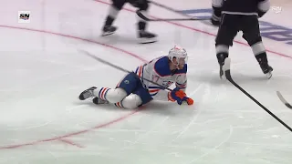 Vlad Gavrikov flips Connor McDavid with a low hit in game 3 vs Oilers (26 apr 2024)
